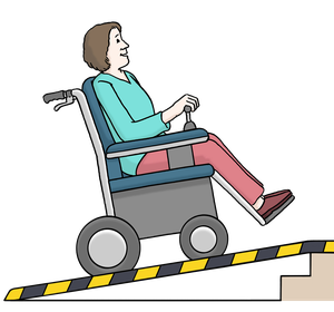 Eine Rollstuhlfahrer kann mit einer Rampe die Treppe hochfahren