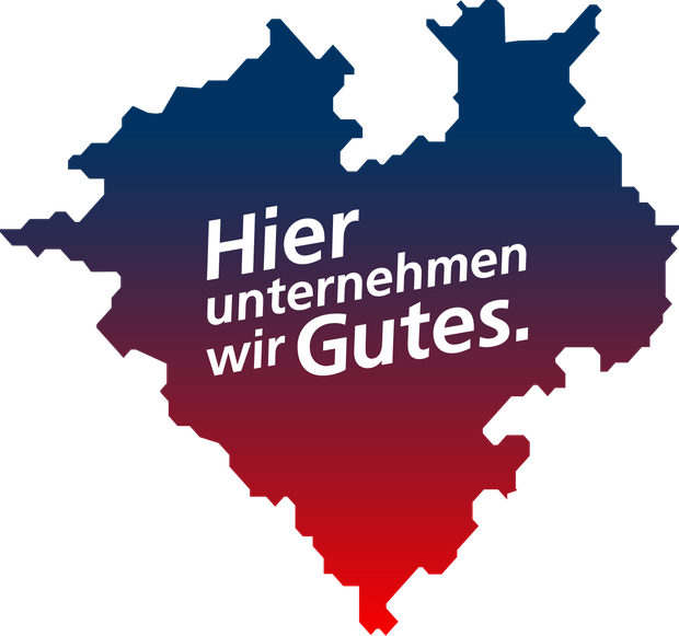Westfalenherz und Schrift "Hier unternehmen wir Gutes"